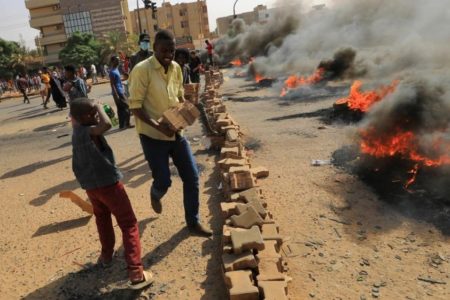 Anti-coup protesters barricade streets, army chief dismisses prosecutor general