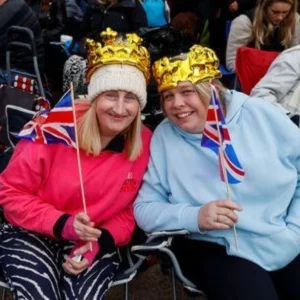 King Charles’ coronation draws tens of thousands braving rain to cheer monarch