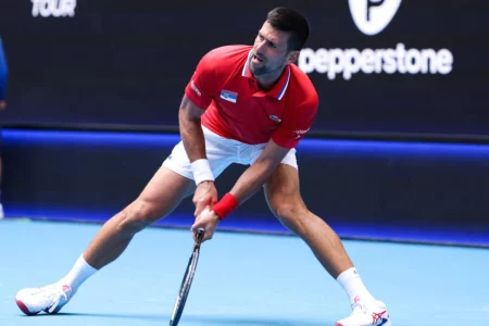 Injury worries for Djokovic, Tsitsipas as Serbia squeeze into quarters