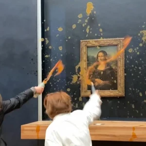 Climate activists hurl soup at the Mona Lisa at the Louvre Museum in Paris