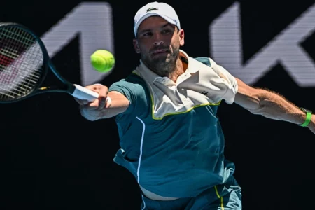 Dimitrov cuts out errors to progress at Australian Open