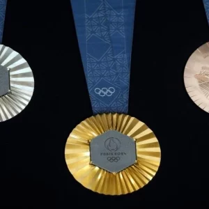 ‘Like a precious stone’: Paris Olympic medals feature pieces of the Eiffel Towe