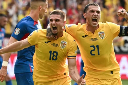 Romania and Slovakia reach last 16 at Euro 2024 after tense draw