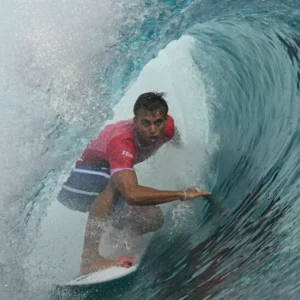 Local hero Kauli Vaast wins Olympic surfing gold in French Polynesia