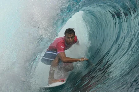 Local hero Kauli Vaast wins Olympic surfing gold in French Polynesia