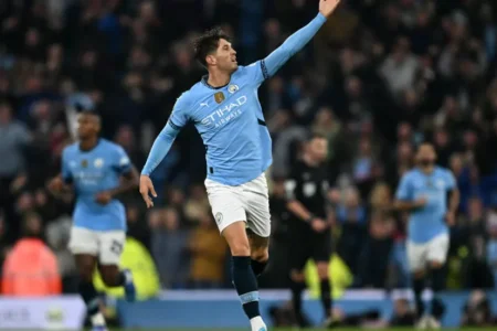 Stones salvages point for Man City against 10-man Arsenal