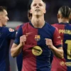 Olmo double helps Liga leaders Barca to derby win over Espanyol