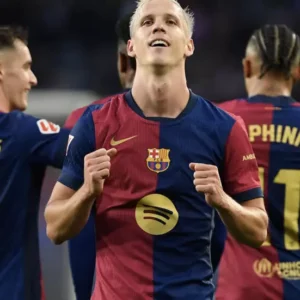 Olmo double helps Liga leaders Barca to derby win over Espanyol