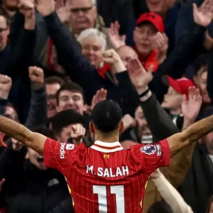 Salah strike beats Brighton to take Liverpool top