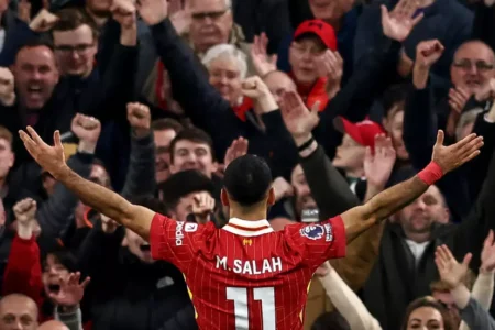 Salah strike beats Brighton to take Liverpool top